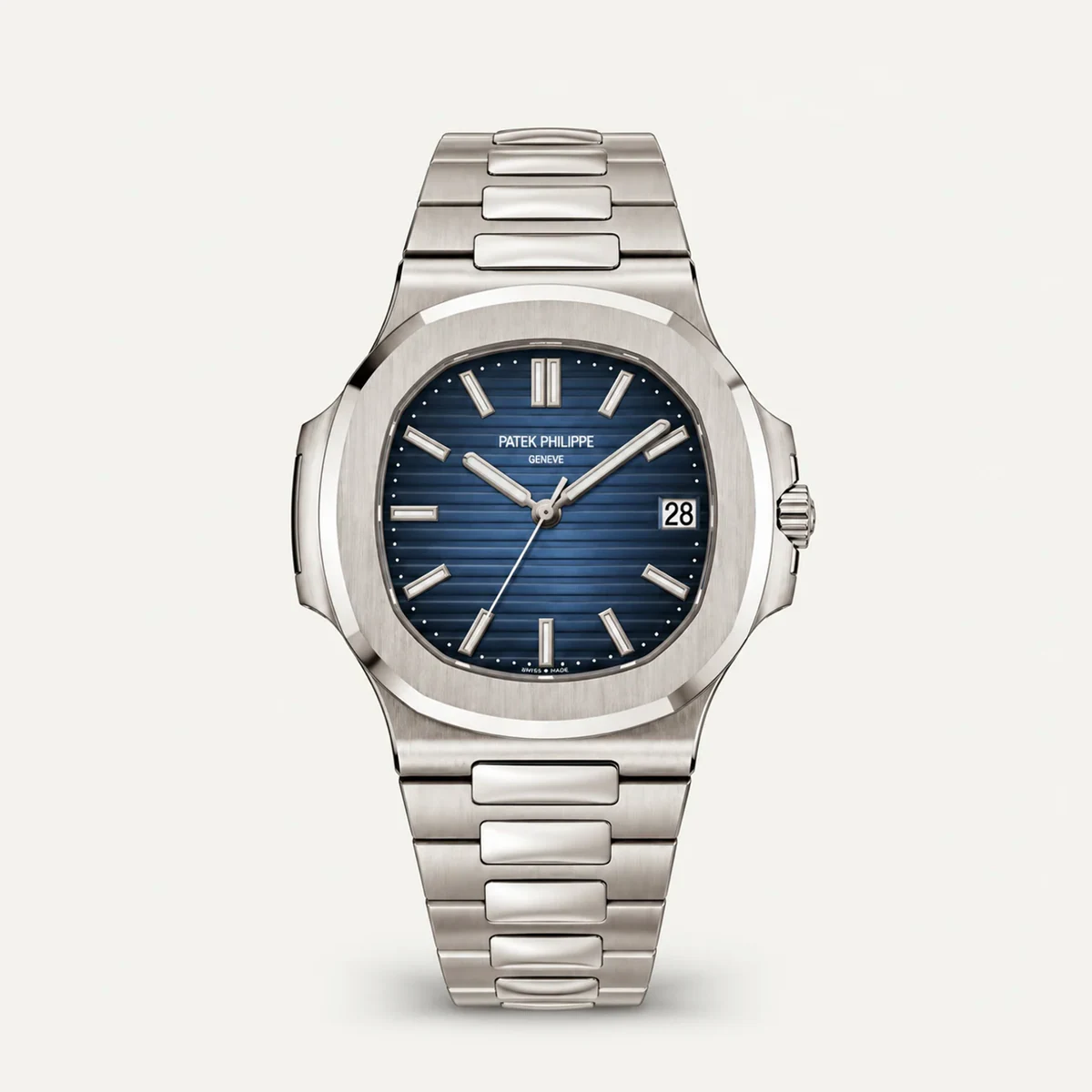 Patek Philippe Nautilus 5811/1G، ميناء أزرق · لون الذهب الأبيض — صورة توضيحية وليست صورة للقطعة