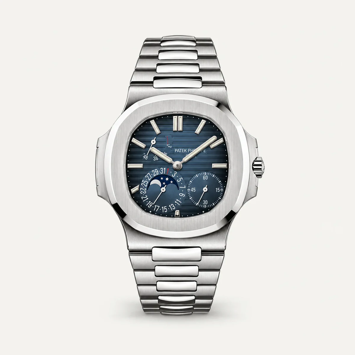 Patek Philippe Nautilus Moon Phase 5712/1A، ميناء أزرق · ستيل — صورة توضيحية وليست صورة للقطعة