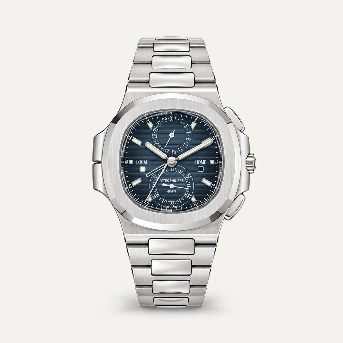 Patek Philippe Nautilus Travel Time Chronograph 5990/1A، ميناء أزرق · ستيل — صورة توضيحية وليست صورة للقطعة