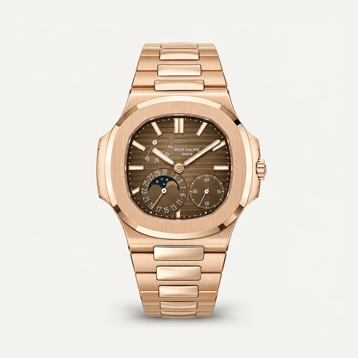 Patek Philippe Nautilus Moon Phase 5712/1R، ميناء بني · لون الذهب الوردي — صورة توضيحية وليست صورة للقطعة