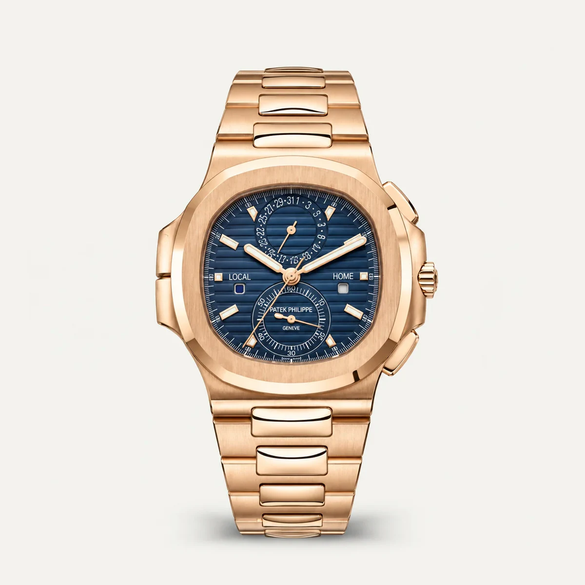 Patek Philippe Nautilus Travel Time Chronograph 5990/1R، ميناء أزرق · لون الذهب الوردي — صورة توضيحية وليست صورة للقطعة