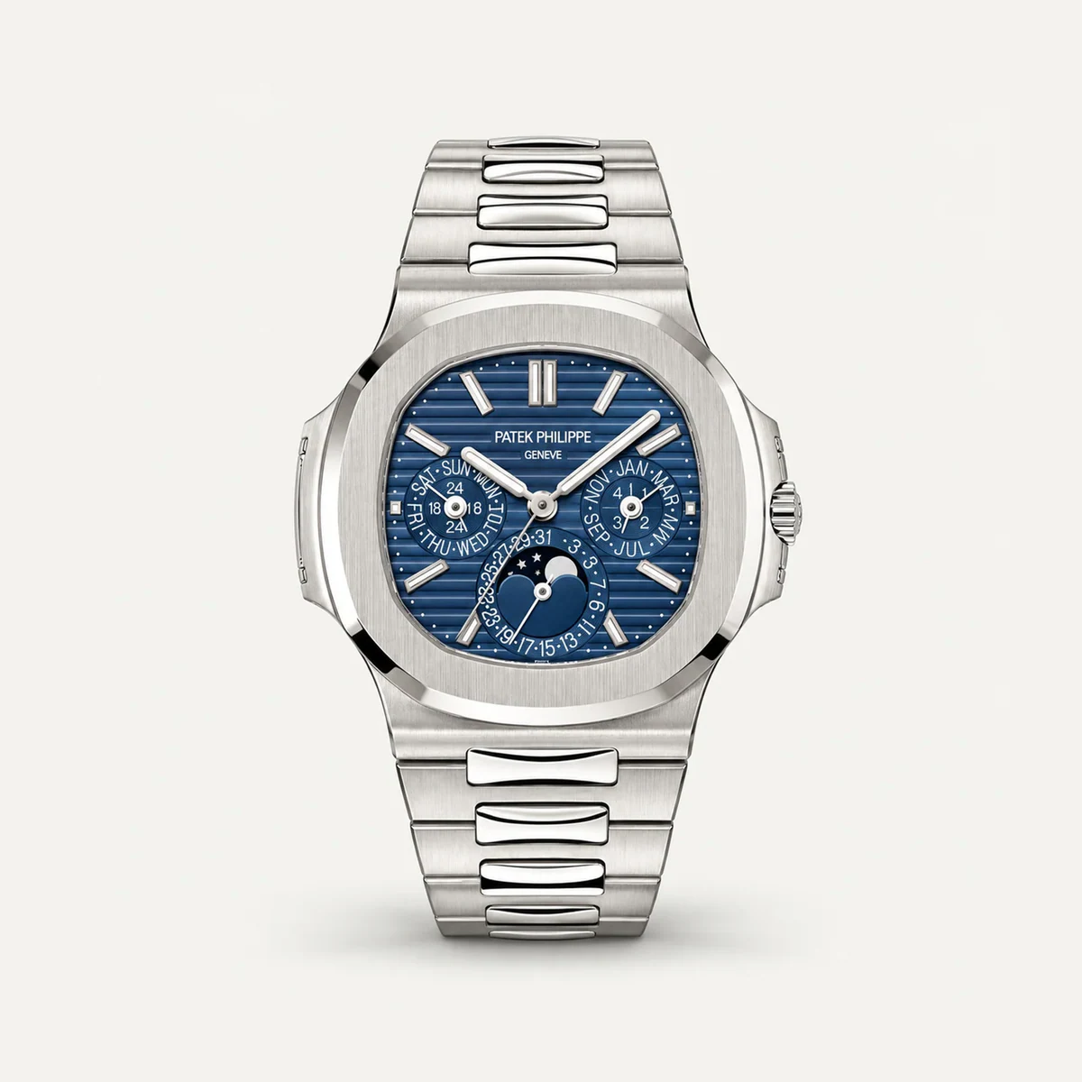 Patek Philippe Nautilus Perpetual Calendar 5740/1G، ميناء أزرق · لون الذهب الأبيض — صورة توضيحية وليست صورة للقطعة